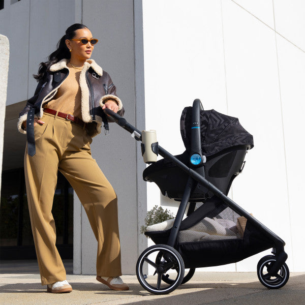 Evenflo Shyft Intuiti+ Travel System featuring Revolve180 LiteMax NXT with SensorySoothe (Dubhan Black)